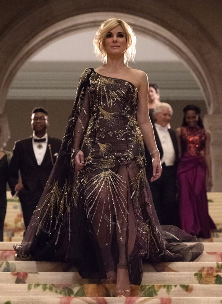 One-shoulder gold-beaded gown